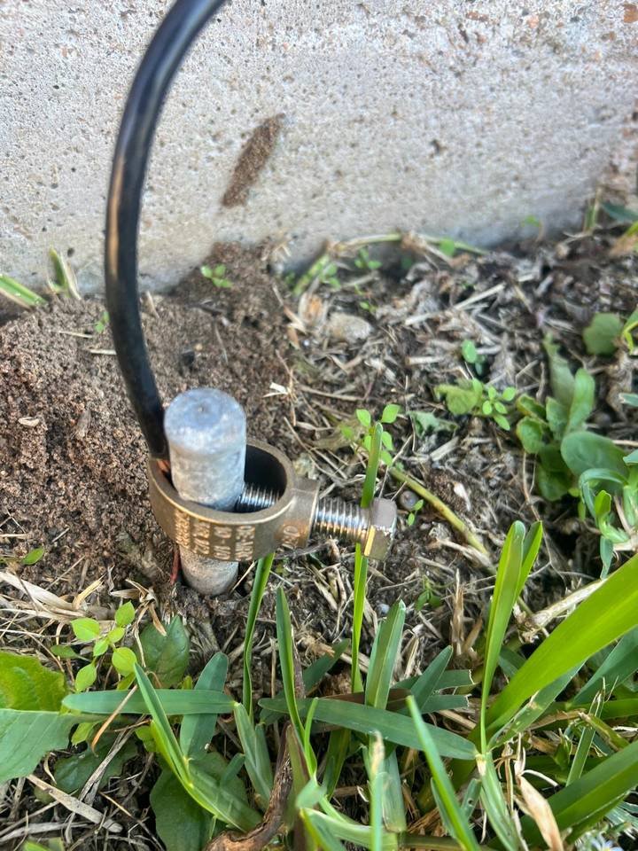 Ground rod with a new bronze ground clamp installed by Mr. Champion Electric